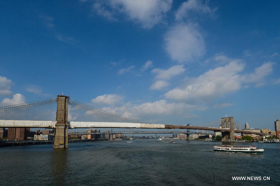 The Brooklyn Bridge is seen in New York, the United States, on May 20, 2013. The Brooklyn Bridge, opened on May 24, 1883, will celebrate its 130th birthday this week. (Xinhua/Niu Xiaolei) 