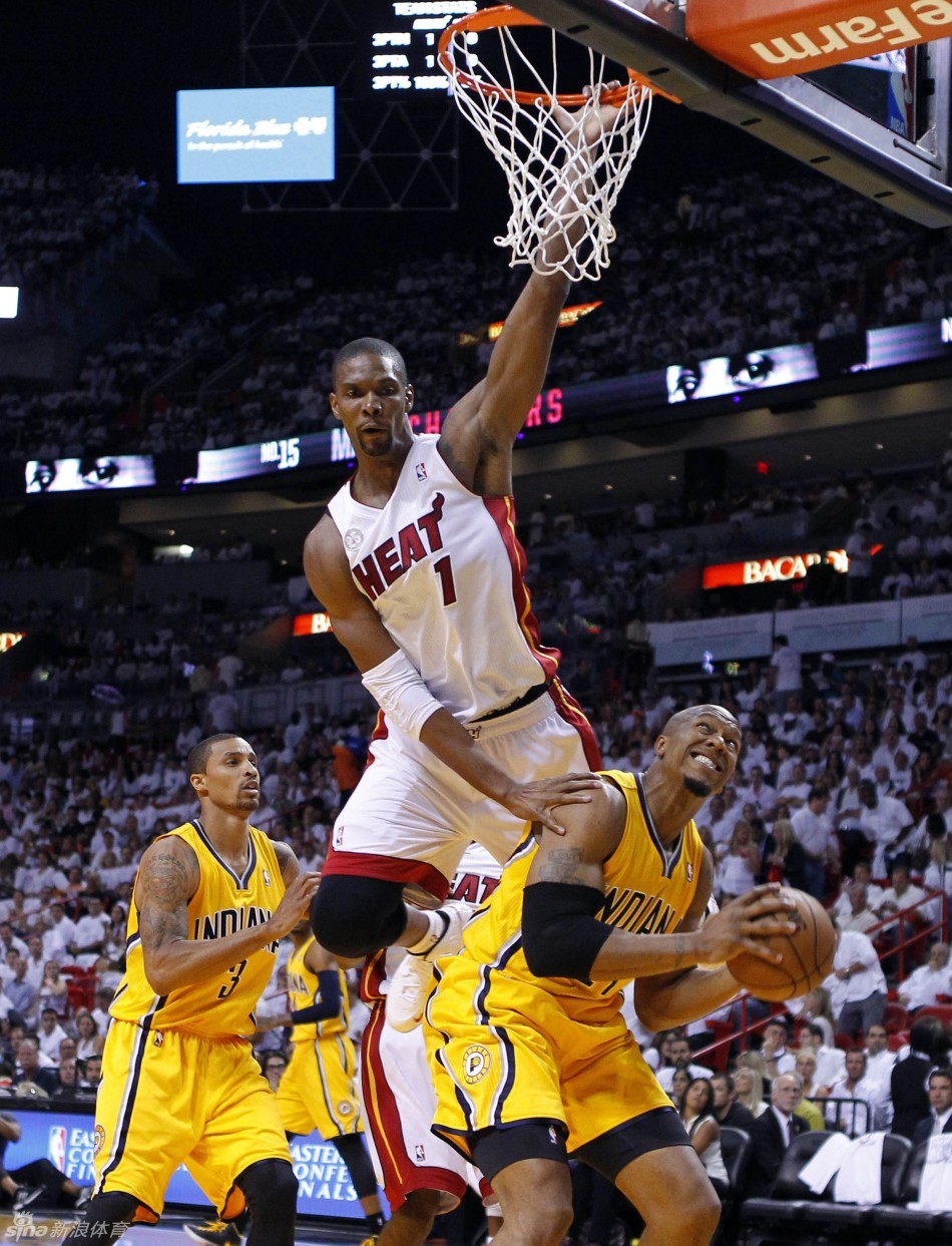 Bosh tries to stop West. 