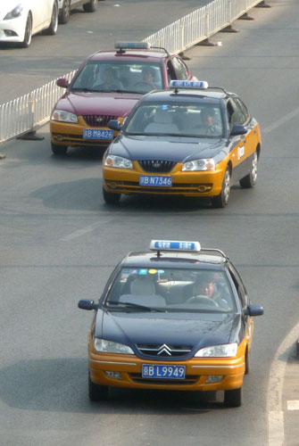 Taxis on the streets in Beijing, April 17, 2013. [Photo/Asianewsphoto]