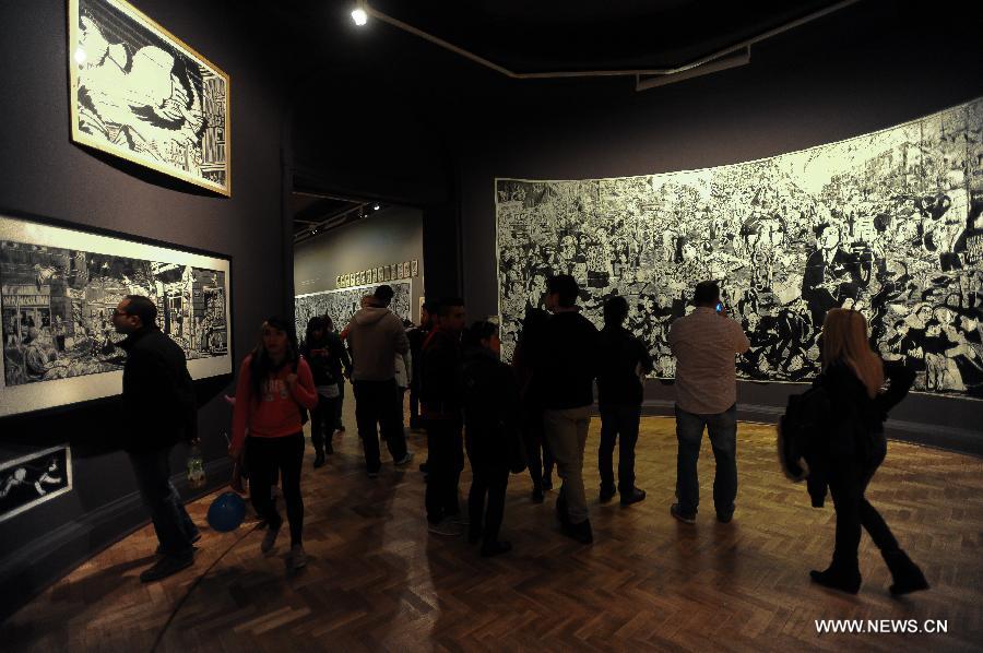 Residents visit the Santiago Cathedral on the Cultural Heritage Day, in Santiago, capital of Chile, May 26, 2013