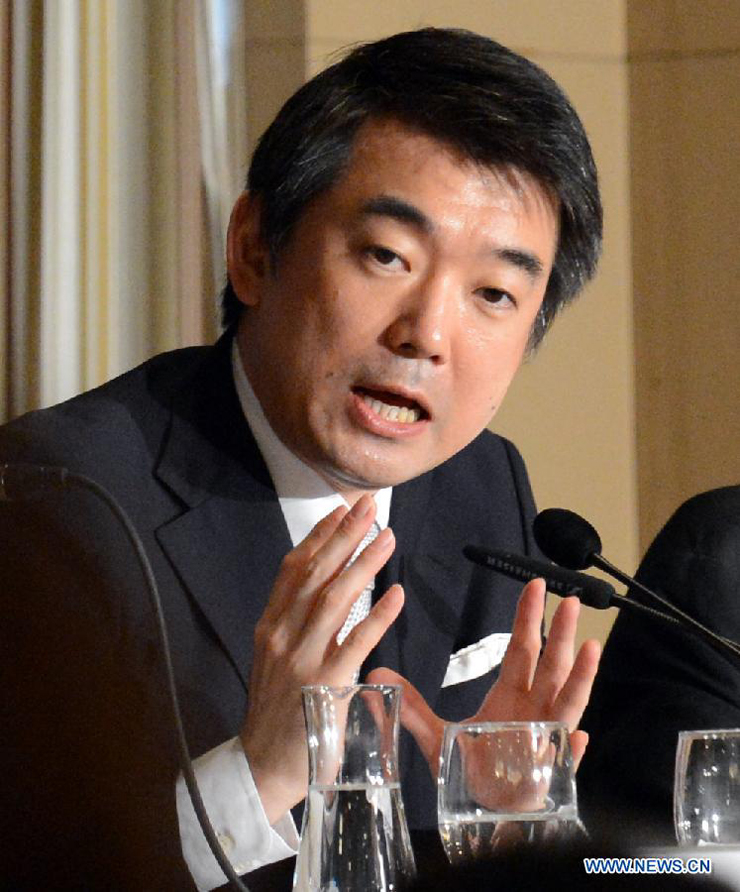 Osaka Mayor Toru Hashimoto speaks during a press conference at the Foreign Correspondents&apos; Club of Japan in Tokyo, May 27, 2013. Toru Hashimoto on Monday denied his remarks on wartime so-called &apos;comfort women&apos; at Foreign Correspondents&apos; Club of Japan, saying it was not his intention at all to say women who were used as sexual slaves during wartime are necessary.