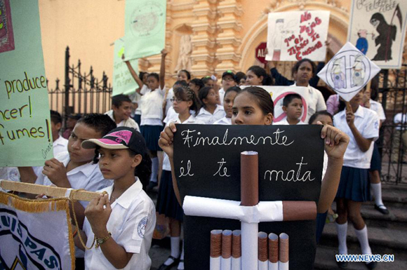 Students participate in a march to mark the World No Tobacco Day, in Tegucigalpa, capital of Honduras, May 31, 2013.