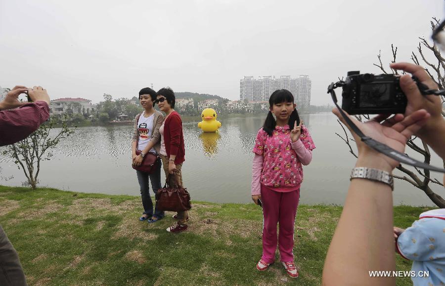 The duck, made by a property company, is a mini copy of the huge rubber duck which appeared in Hong Kong, south China, on May 2. 