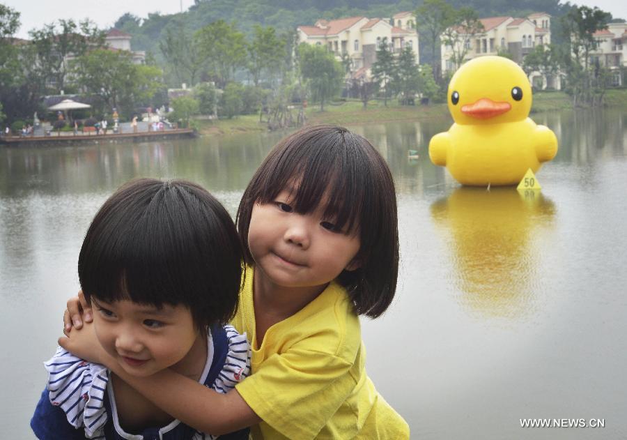 The duck, made by a property company, is a mini copy of the huge rubber duck which appeared in Hong Kong, south China, on May 2. 