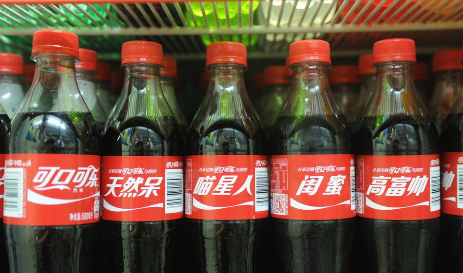 Coke bottles' buzzwords attract youth.[File photo]