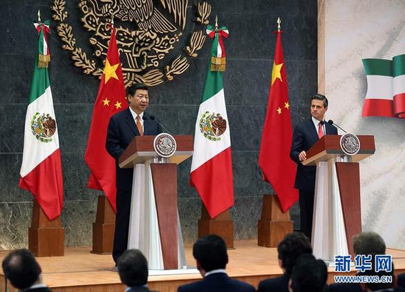 President Xi Jinping and his Mexican counterpart Enrique Pena Nieto meet the press in Mexico City on Tuesday. [Yao Dawei/Xinhua] 