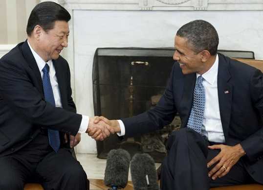 US President Barack Obama shakes hands with then Chinese Vice-President Xi Jinping on February 14, 2012 in Washington DC. [Photo: AFP]