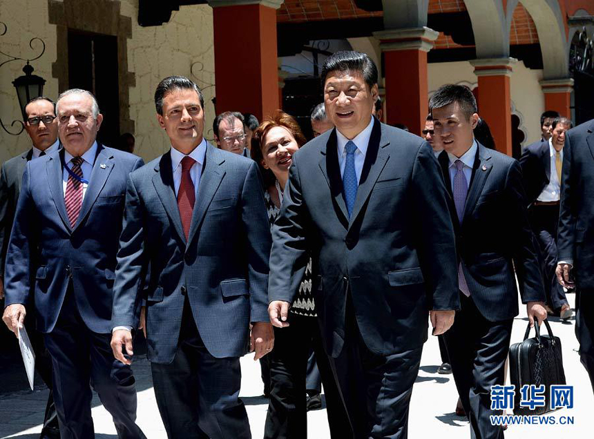 Visiting Chinese President Xi Jinping on Wednesday attends and speaks at a conference of Chinese and Mexican entrepreneurs in Mexico City, accompanied by his Mexican counterpart Enrique Pena Nieto. 