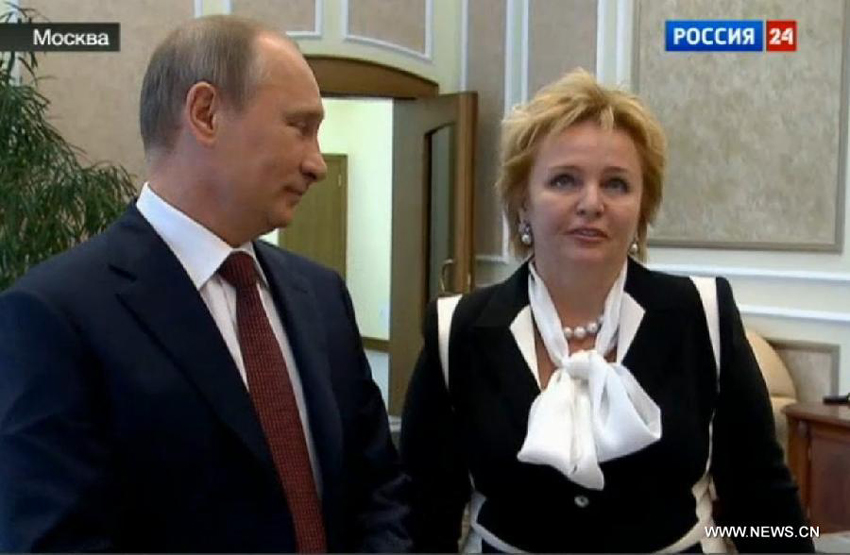 Image taken from video shows Russian President Vladimir Putin and his wife Lyudmila Putina being interviewed in a program on a local news TV channel on June 6, 2013. Putin and his wife Lyudmila Putina on Thursday announced their divorce. 