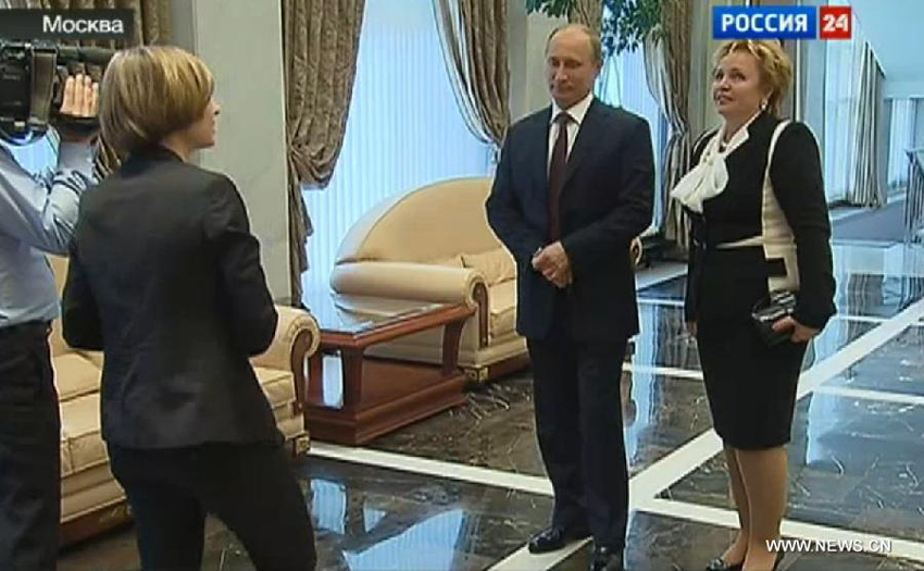 Image taken from video shows Russian President Vladimir Putin and his wife Lyudmila Putina being interviewed in a program on a local news TV channel on June 6, 2013. Putin and his wife Lyudmila Putina on Thursday announced their divorce.