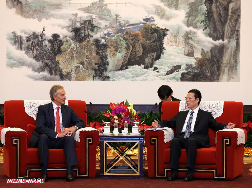 Chinese Vice Premier Zhang Gaoli (R) meets with former British Prime Minister Tony Blair during the 2013 Fortune Global Forum (FGF) in Chengdu, capital of southwest China&apos;s Sichuan Province, June 6, 2013.