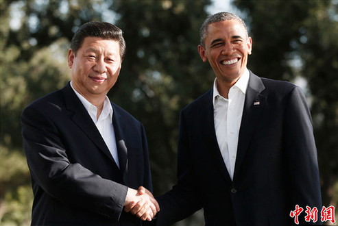 Chinese President Xi Jinping is greeted by U.S. President Barack Obama at the Annenberg Retreat, California, the United States, June 7, 2013.