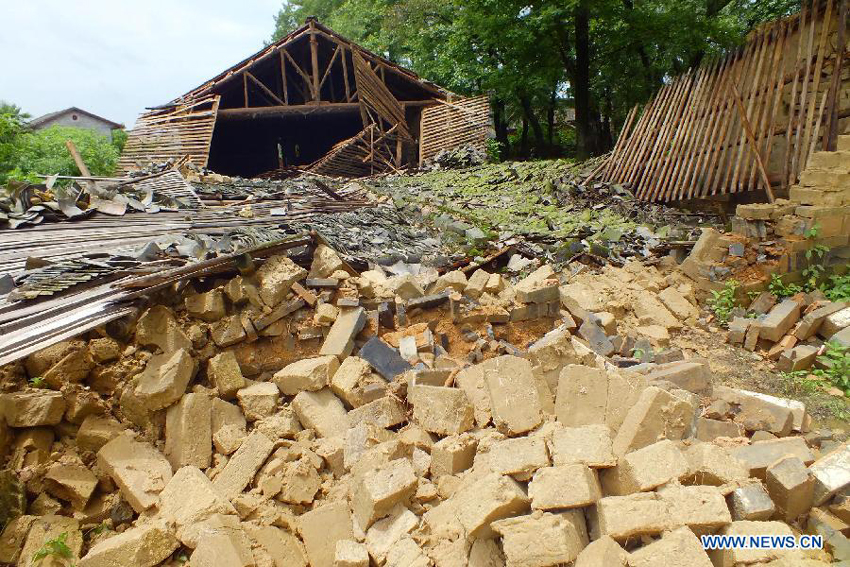 Photo taken on June 7, 2013 shows house ruins after a heavy rainfall in Datuan Village, Jing&apos;an County, east China&apos;s Jiangxi Province. A rainstorm hit the county since Thursday night, with the precipitation reaching to 186 mm. A total of 18,926 thousand people in Jing&apos;an were affected by the rainfall, with 705 people being displaced to safe places. 