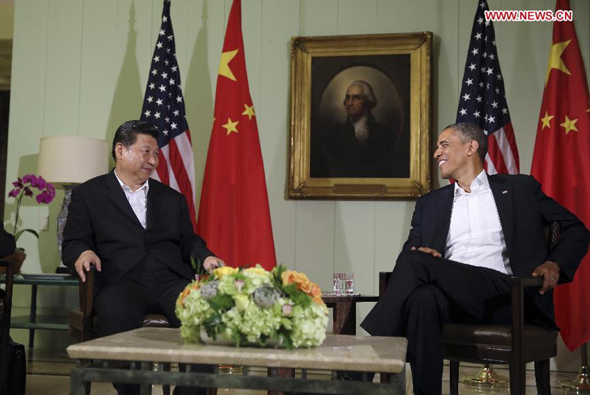 Chinese President Xi Jinping (L) and U.S. President Barack Obama meet the press after their meeting at the Annenberg Retreat, California, the United States, June 7, 2013. 