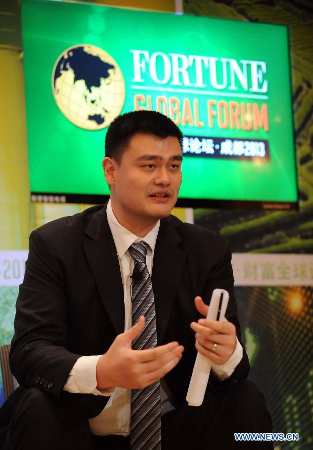 Yao Ming takes part in the discussion &apos;Global Perspective and Viewpoints: Opening Hearts and Wallets&apos; during the ongoing 2013 Fortune Global Forum in Chengdu, capital of southwest China&apos;s Sichuan Province, June 8, 2013. 