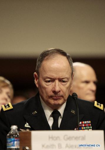U.S. Army Gen. Keith Alexander, commander of the U.S. Cyber Command, director of National Security Agency (NSA), testifies before a Senate Appropriations Committee hearing in Washington D.C. on June 12, 2013. [Fang Zhe/Xinhua]
