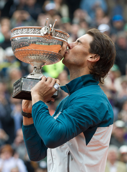 Rafael Nadal beat David Ferrer in straight sets to win his eighth French Open title at Roland Garros on Sunday.