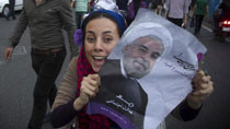 Hassan Rouhani's supporters celebrate election victory