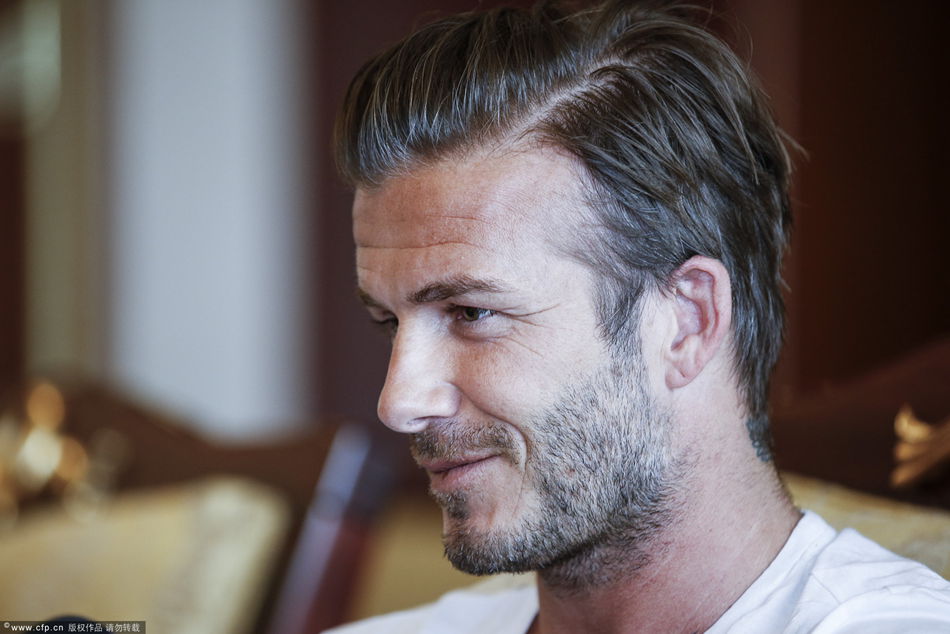 David Beckham arrives in Beijing on Monday, June 17, 2013 to start his China tour. 