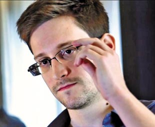China dismisses claims of Snowden spying