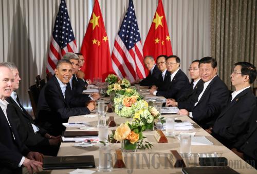 Chinese President Xi Jinping holds talks with U.S. President Barack Obama at the Sunnylands estate in California on June 8 [Yao Dawei]