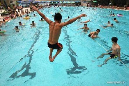 China is experiencing its first heat wave of the summer. 