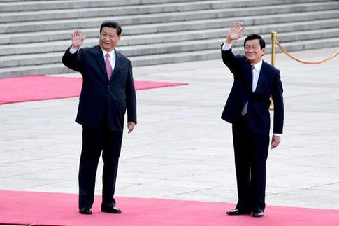 Chinese President Xi Jinping meets his Vietnamese counterpart Truong Tan Sang.    