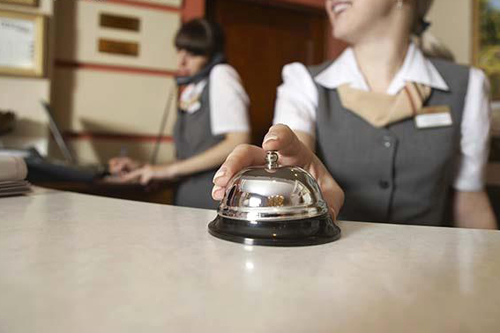 Hotel receptionist,one of the 'Top 10 lowest paying jobs for Chinese graduates 2013'by China.org.cn.