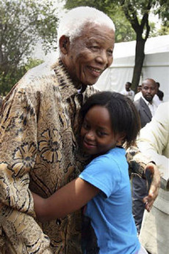 Former South African President Nelson Mandela (L) and his granddaughter Zenani Mandela who was killed in a car accident on June 11, 2010. [Xinhua File Photo] 