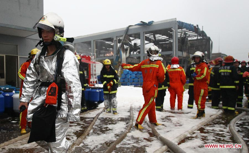 Fire fighters work to put out a fire caused by an explosion at a chemical plant in the Jinshan district of east China&apos;s Shanghai, June 24, 2013. Six people were injured in the accident at about 2:15 p.m. The fire has been extinguished as of 3:30 p.m..(