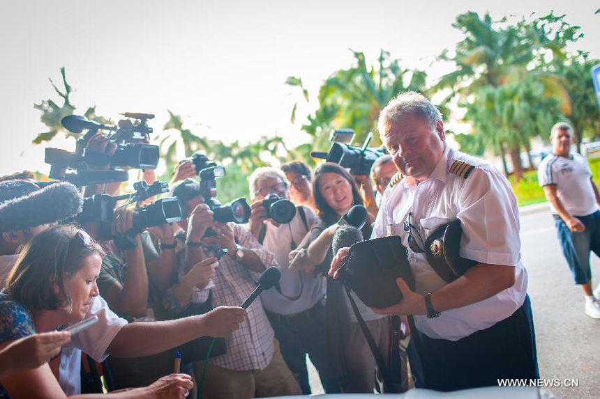 A staff of the flight SU150 from Moscow, Russia, is surrounded by journalists at the Jose Marti airport in Havana, Cuba, June 24, 2013. Former U.S. intelligence contractor Edward Snowden did not show up at the flight.