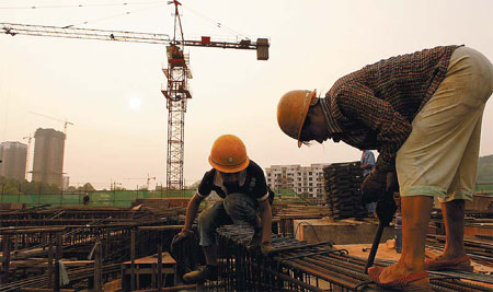 Construction workers at a housing project site in Chongqing. Home prices saw their 13th consecutive increase in June, with the national average rising to 10,258 yuan ($1,673) per square meter. 