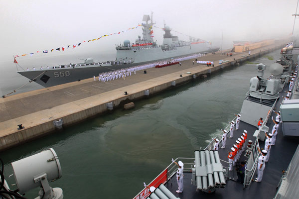 Chinese navel vessels prepare to depart from harbor city of Qingdao to participate in Sino-Russian joint naval drills, July 1, 2013.[Photo/Xinhua] 