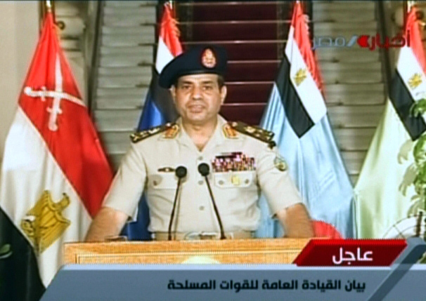 An image grab taken from Egyptian state TV shows Egyptian Defence Minister Abdelfatah al-Sissi delivering a statement on July 3, 2013 as the army unveils a roadmap for Egypt's political future, with state media reporting that the plan sets a tight schedule for new elections.[Xinhua] 