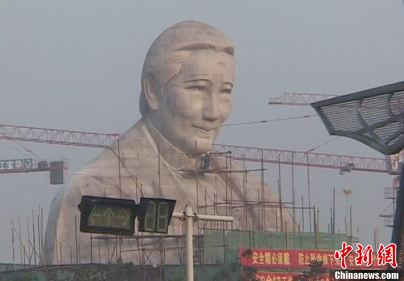 The 27-meter stone statue of Soong Ching Ling (1893-1981) under construction in Zhengzhou, Henan Province, in November 2011.