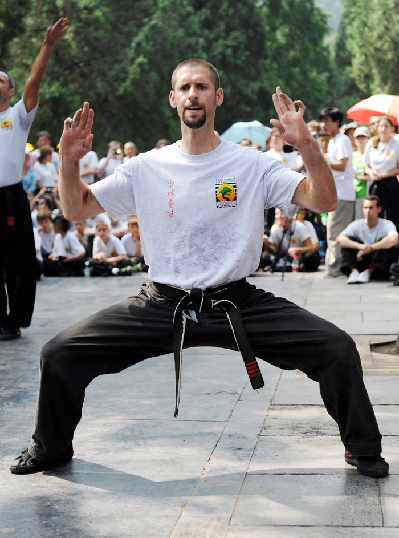 Members from the USSD perform martial arts.[Photo/Xinhua] 