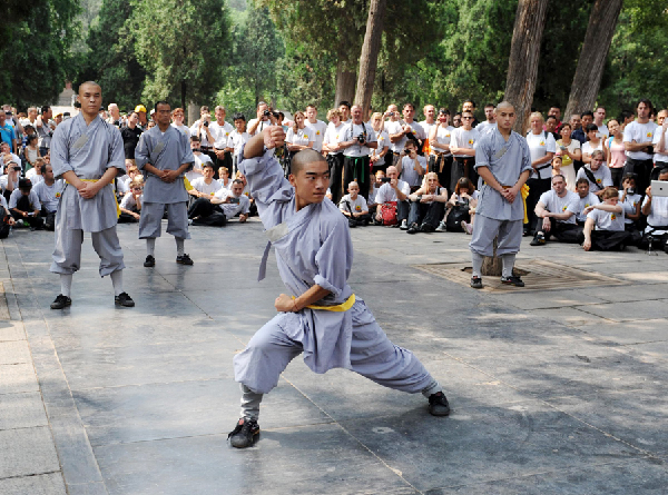 Monks from the Shaolin Temple perform martial arts. [Photo/Xinhua] 