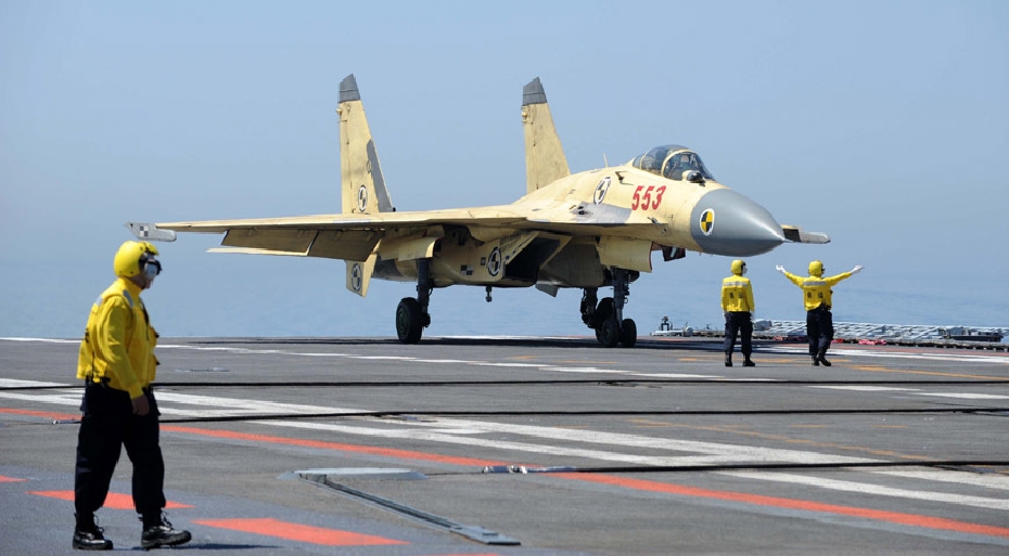 China on June 19 successfully conducted taking-off and landing exercises of J-15 fighter jets on the country's first aircraft, the Liaoning. This is the second time the country has conducted such training after a first jet landing exercise passed successfully on the deck in November last year.[[Photo/Navy.81.cn]]