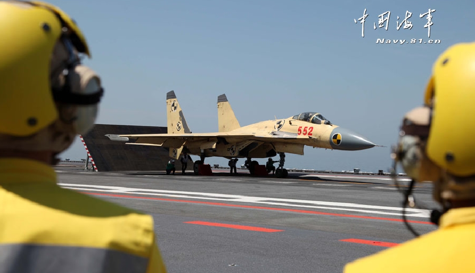 China on June 19 successfully conducted taking-off and landing exercises of J-15 fighter jets on the country's first aircraft, the Liaoning. This is the second time the country has conducted such training after a first jet landing exercise passed successfully on the deck in November last year.[Photo/Navy.81.cn]