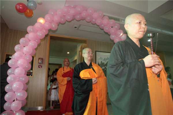 A Buddhism wedding held in Xiamen city, Fujian province on July 6, 2013. 