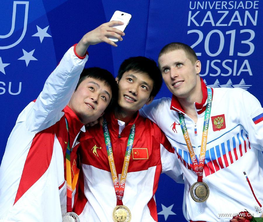 Lin Jin of China competes during the final of men's 1m Springboard diving at the 27th Summer Universiade in Kazan, Russia, July 8, 2013. Lin Jin won the gold medal with 429.05. (Xinhua/Li Ying) 