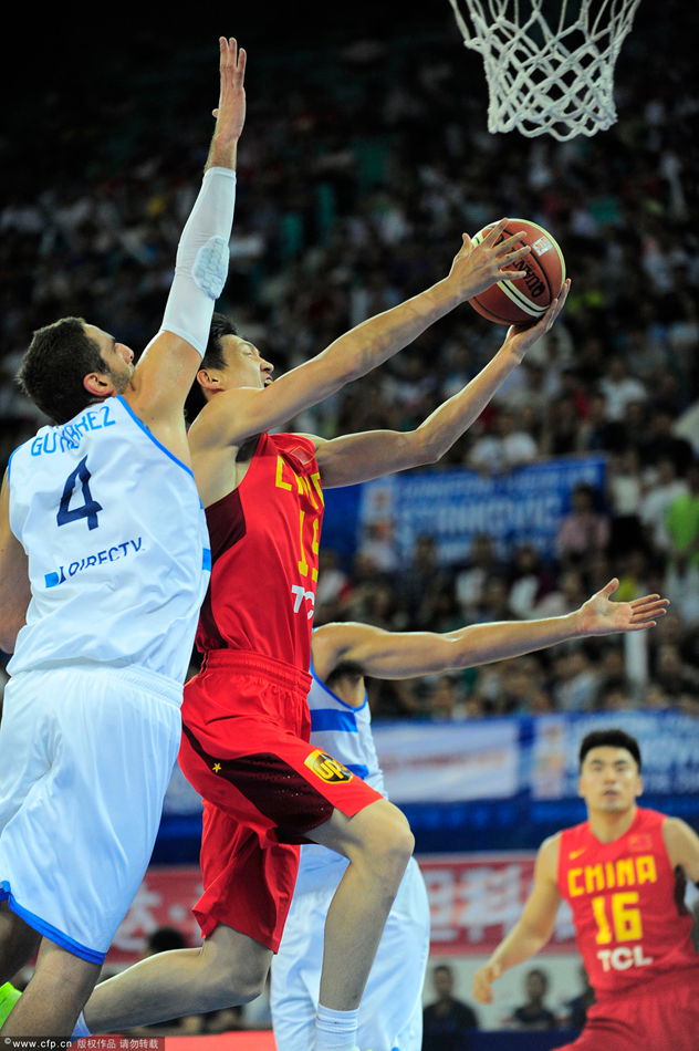  Zhou Peng of China goes up for a basket.