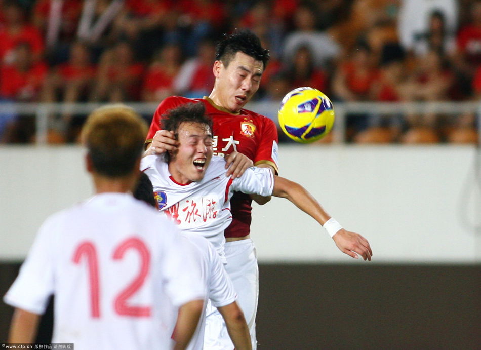 Guangzhou Evergrande eased past Dali Ruilong 7-1 to move into last 8 of Chinese FA Cup on July 10, 2013. 