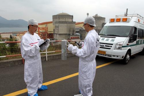 Environmental monitoring: Staff members test the air around the Dayawan nuclear power facilities 