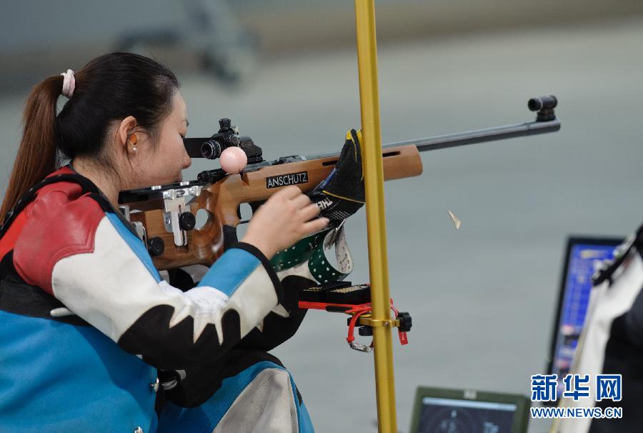 Ma Hong of China wins gold medal in women's 50m rifle 3 positions individual.