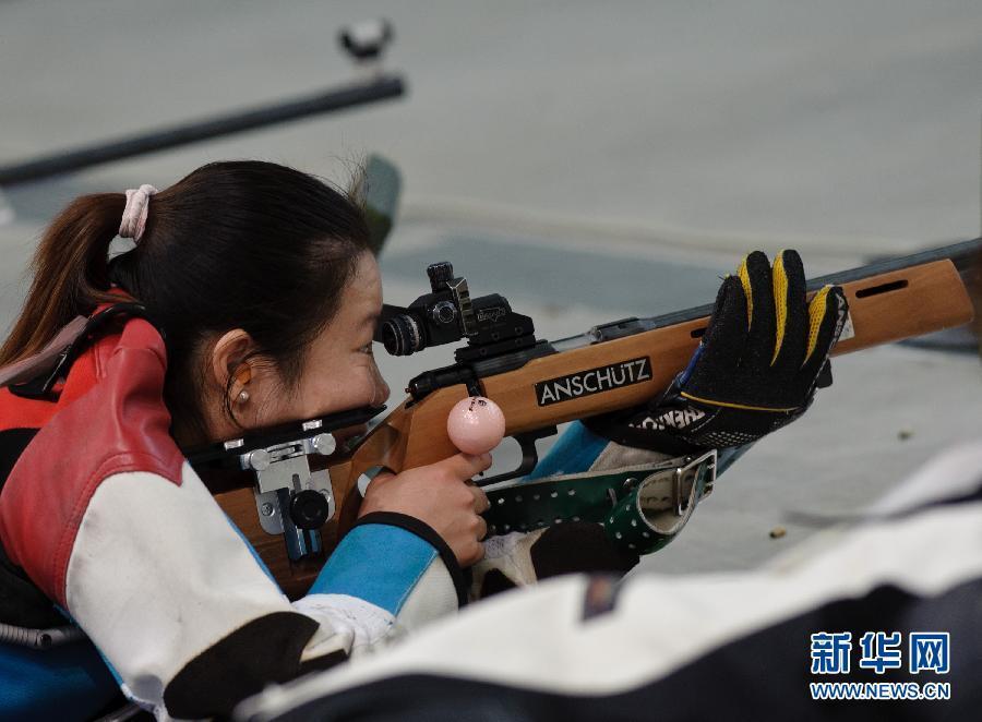 Ma Hong of China wins gold medal in women's 50m rifle 3 positions individual.