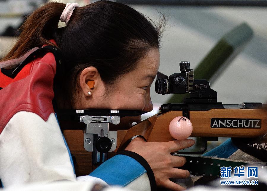 Ma Hong of China wins gold medal in women's 50m rifle 3 positions individual.