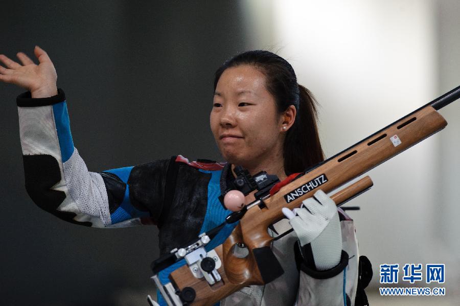 Ma Hong of China wins gold medal in women's 50m rifle 3 positions individual.