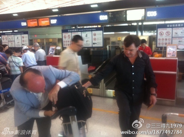Former head coach of China's national soccer team José Antonio Camacho is seen at the Beijing Airport on July 16, 2013.