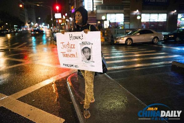 A woman protests against the acquittal of George Zimmerman. 